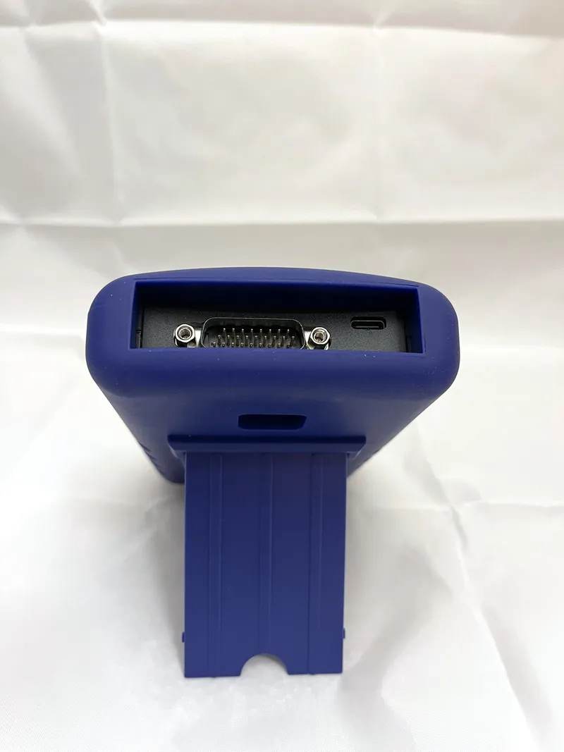 Connector end of a TapCAN in a blue boot, DB26 and USB-C visible, stand extended