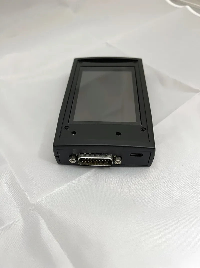TapCAN with the rubber boot removed, showing the bare enclosure, DB26 and USB-C